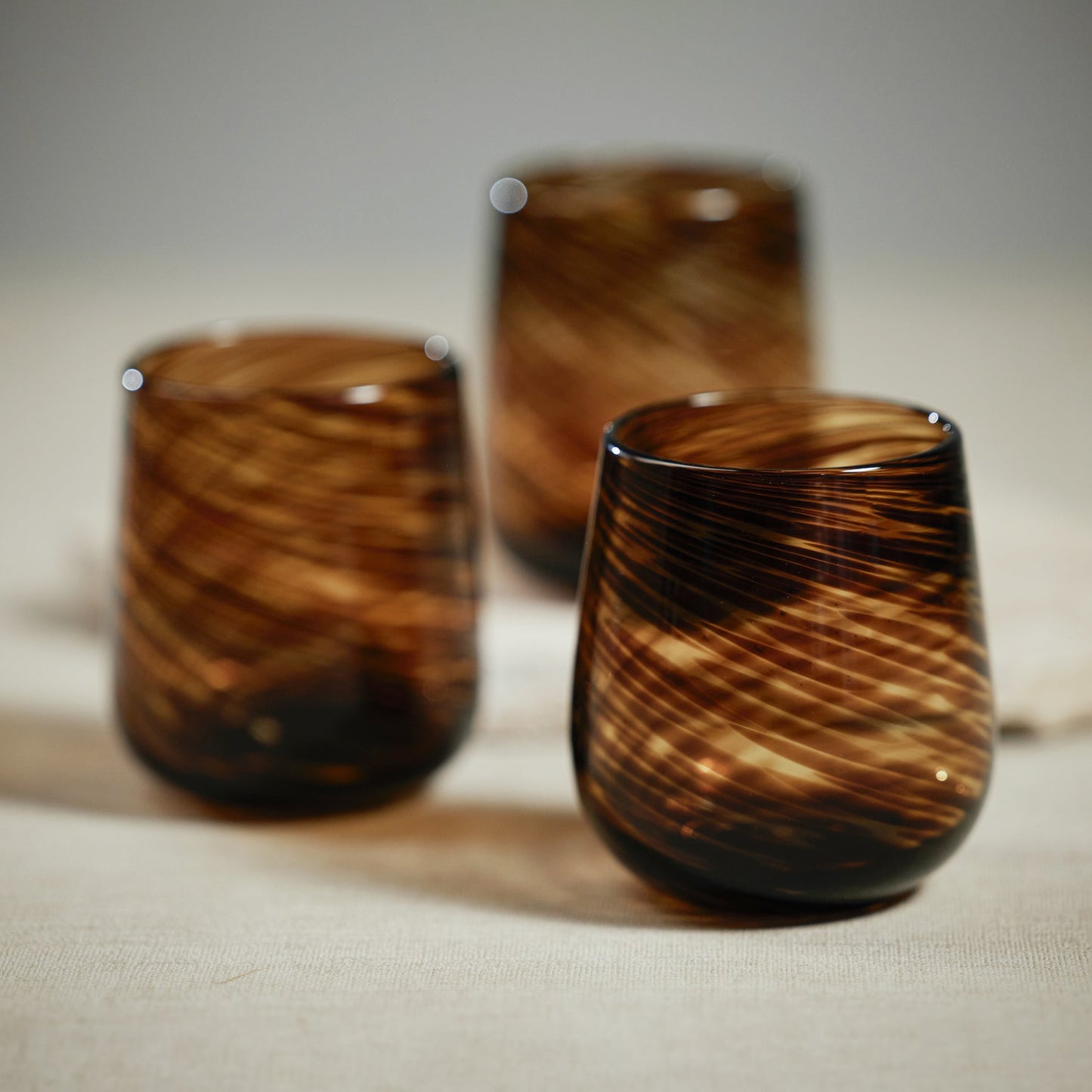 Stemless Tortoise All Purpose Glass - Amber & Black/Amber & Black Spiral sold in Sets of 6